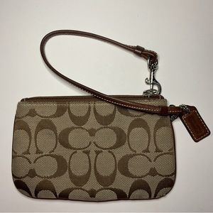 Tan and Brown Coach Wristlet